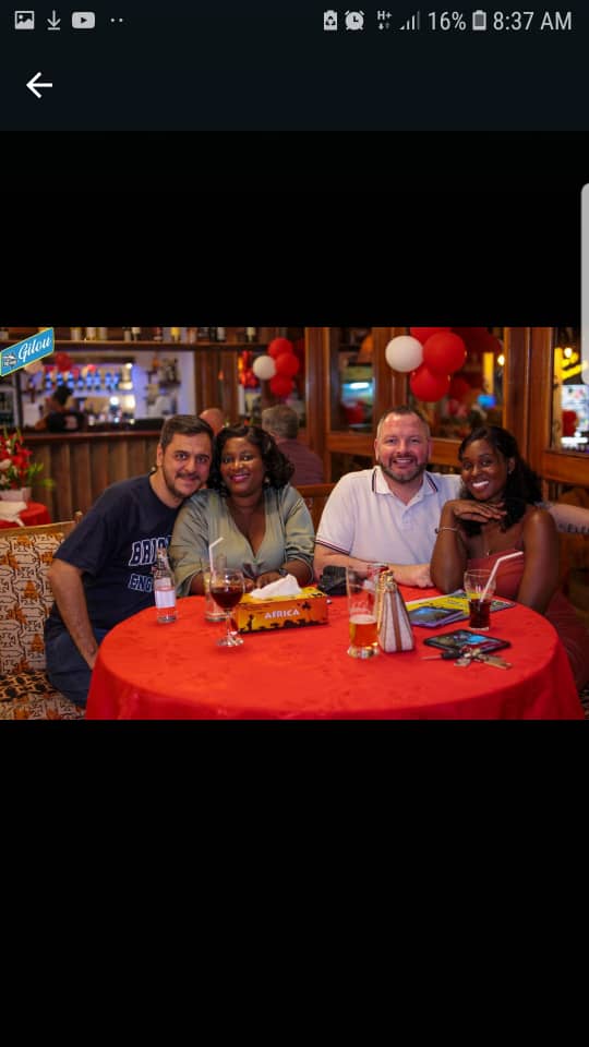 Happy guests dining at Gilou Bar & Restaurant